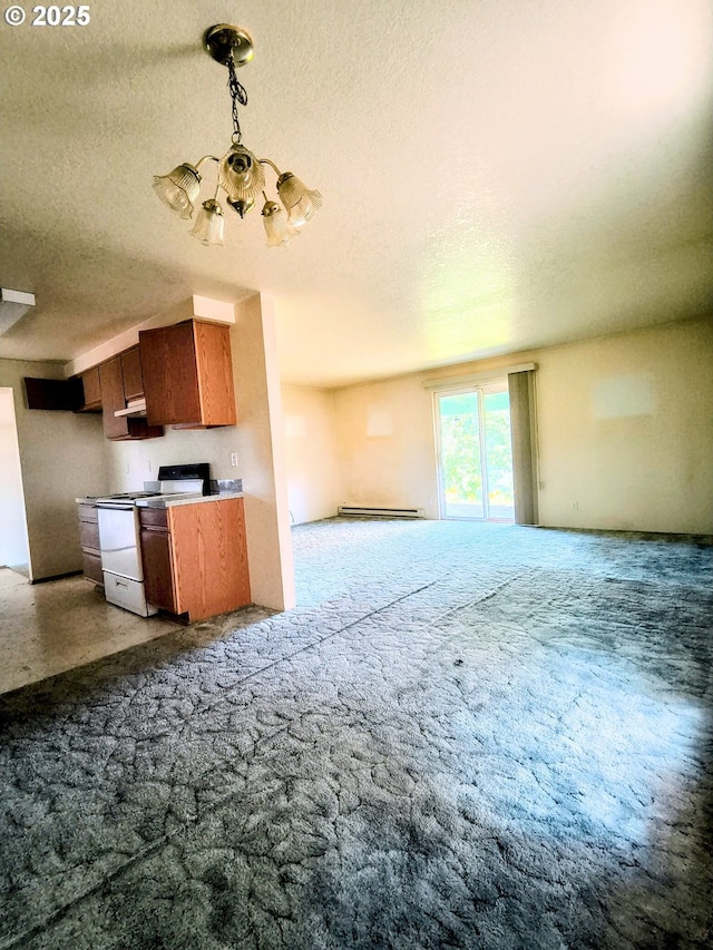 444 Char St, Roseburg, OR 97471 - kitchen with electric stove, open floor plan, carpet, a textured ceiling, and a chandelier