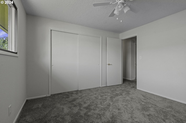 5323 Verda Ln, Keizer, OR 97303 - unfurnished bedroom featuring carpet, a closet, a textured ceiling, baseboards, and ceiling fan