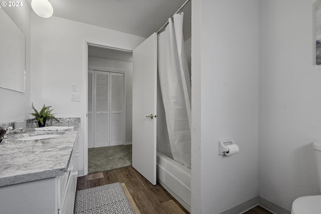 5323 Verda Ln, Keizer, OR 97303 - bathroom with toilet, vanity, wood finished floors, shower / tub combo, and a closet