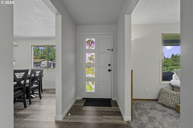5323 Verda Ln, Keizer, OR 97303 - foyer with wood finished floors, baseboards, and a textured ceiling