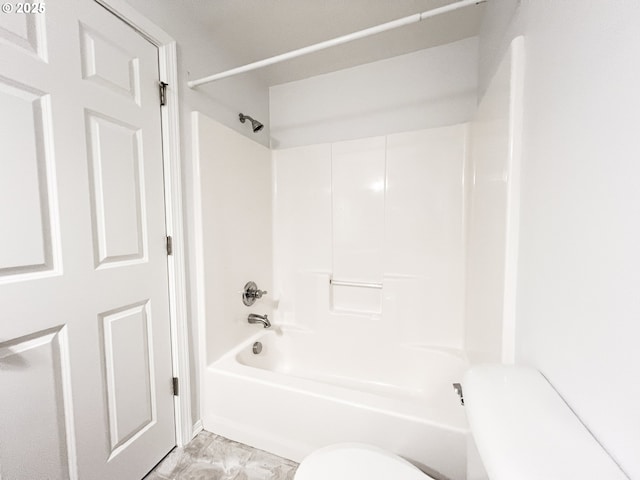 full bath featuring toilet and tub / shower combination