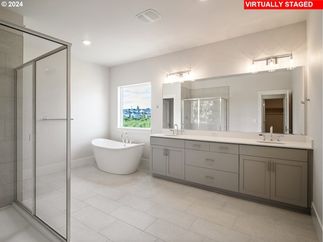 13998 SW 165th Ave, Tigard, OR 97223 - full bathroom featuring a shower stall, double vanity, and a freestanding tub