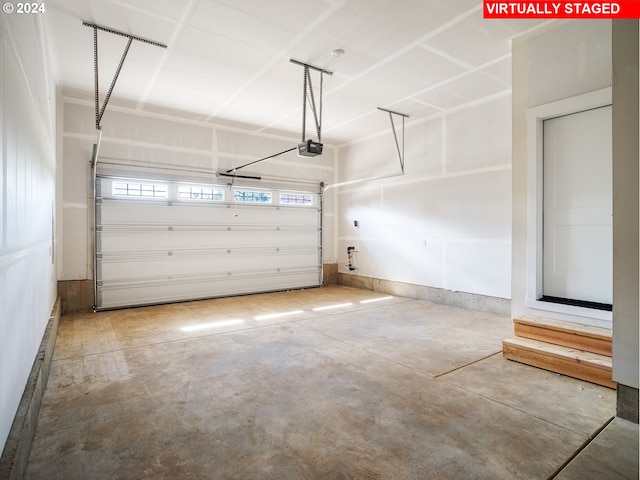 13998 SW 165th Ave, Tigard, OR 97223 - garage featuring a garage door opener