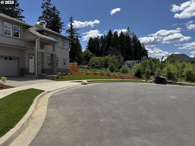 13998 SW 165th Ave, Tigard, OR 97223 - view of asphalt street with curbs and sidewalks