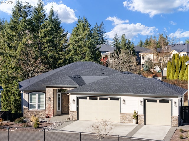 view of front of property with a garage