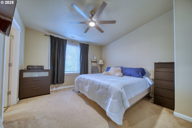 9575 SW Tephra Ter, Beaverton, OR 97007 - carpeted bedroom featuring baseboards, ceiling fan, and vaulted ceiling