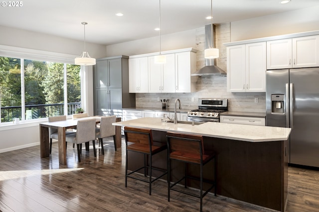 21420 NE Red Hills Ln, Dundee, OR 97115 - kitchen featuring stainless steel appliances, wall chimney range hood, backsplash, a kitchen island with sink, and recessed lighting