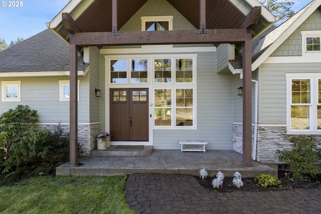 21420 NE Red Hills Ln, Dundee, OR 97115 - doorway to property with stone siding and a shingled roof