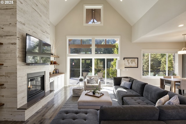 21420 NE Red Hills Ln, Dundee, OR 97115 - living room with high vaulted ceiling, dark wood finished floors, a fireplace, and recessed lighting