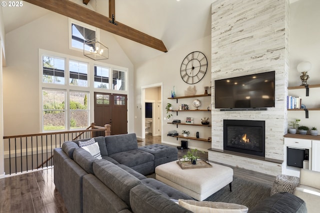 21420 NE Red Hills Ln, Dundee, OR 97115 - living room featuring high vaulted ceiling, wood finished floors, a chandelier, a fireplace, and beam ceiling