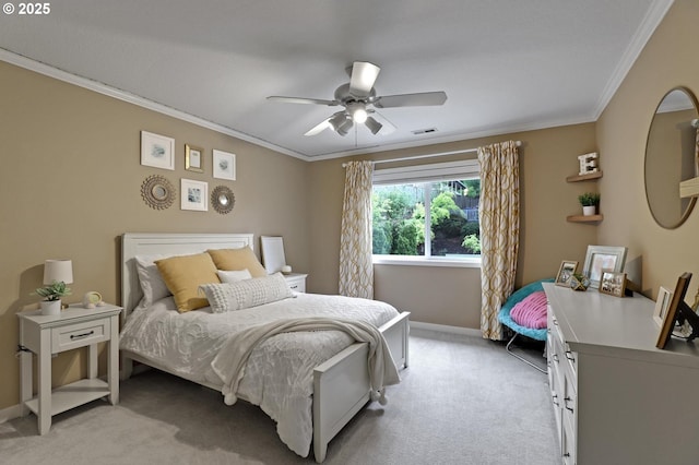 bedroom featuring light carpet, crown molding, baseboards, and a ceiling fan