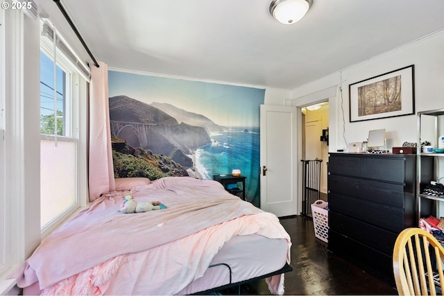 3905 SE 54th Ave, Portland, OR 97206 - bedroom with crown molding and dark wood-style flooring