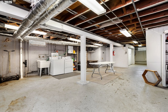 3905 SE 54th Ave, Portland, OR 97206 - unfinished below grade area with washing machine and dryer and a sink