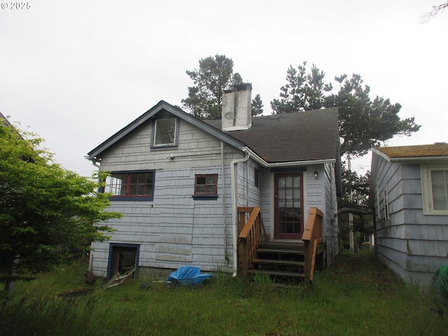 328 6th Ave, Seaside, OR 97138 - rear view of house featuring a chimney