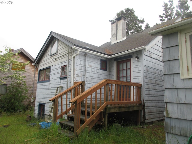 328 6th Ave, Seaside, OR 97138 - rear view of house with a chimney