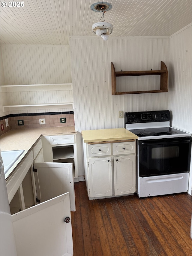 328 6th Ave, Seaside, OR 97138 - kitchen featuring electric stove, open shelves, dark wood-style flooring, light countertops, and white cabinets