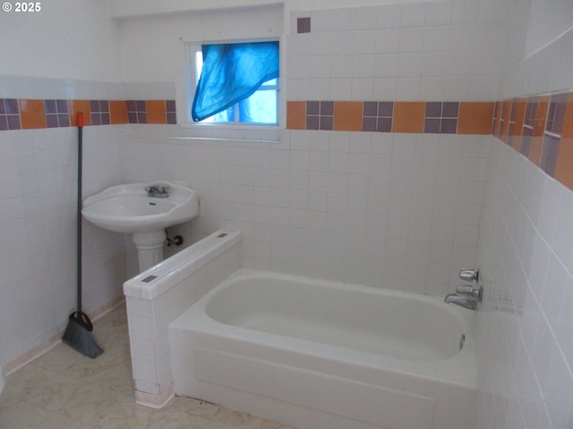 328 6th Ave, Seaside, OR 97138 - full bathroom with a tub and tile walls