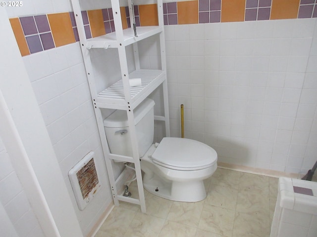328 6th Ave, Seaside, OR 97138 - bathroom with toilet and tile walls