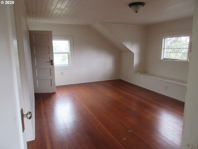 328 6th Ave, Seaside, OR 97138 - bonus room featuring wood-type flooring and wooden walls