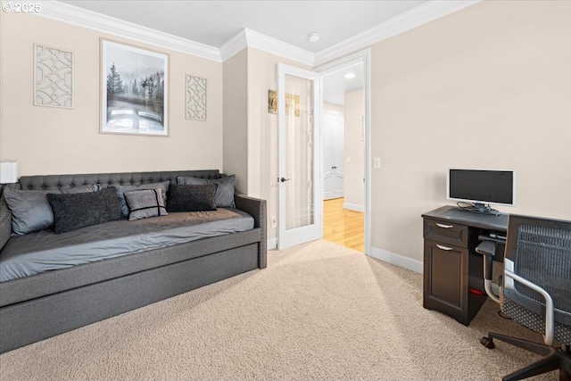 home office with light carpet, french doors, and ornamental molding