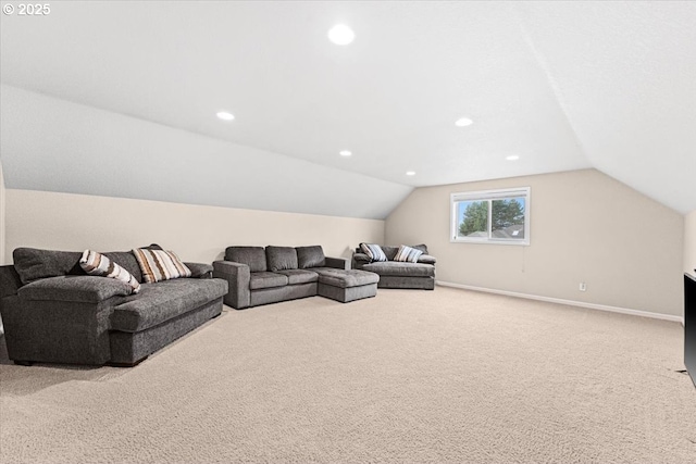 carpeted living room with lofted ceiling