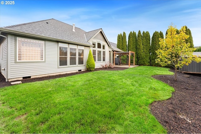 exterior space with a patio and a lawn