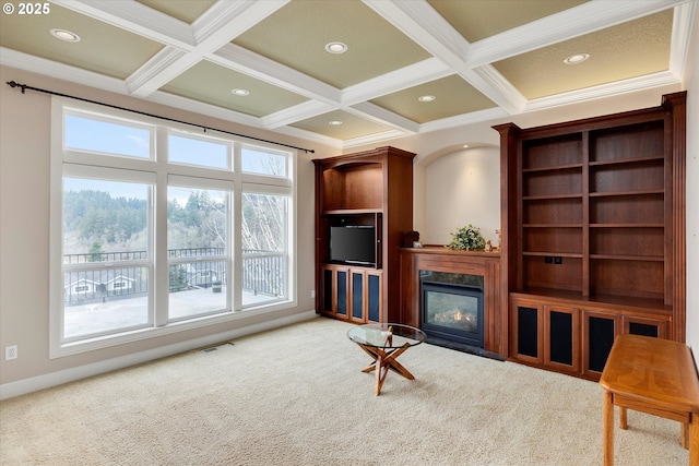 carpeted living room featuring beamed ceiling, coffered ceiling, and ornamental molding