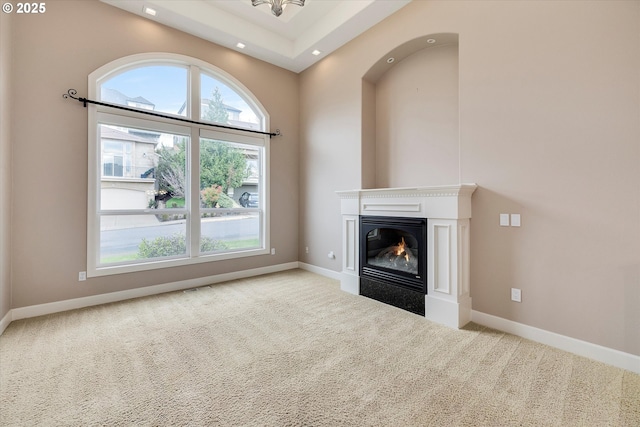 unfurnished living room with carpet flooring