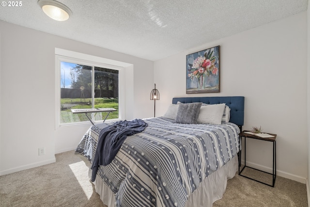 27650 SW Canyon Creek Rd, Wilsonville, OR 97070 - carpeted bedroom with baseboards and a textured ceiling
