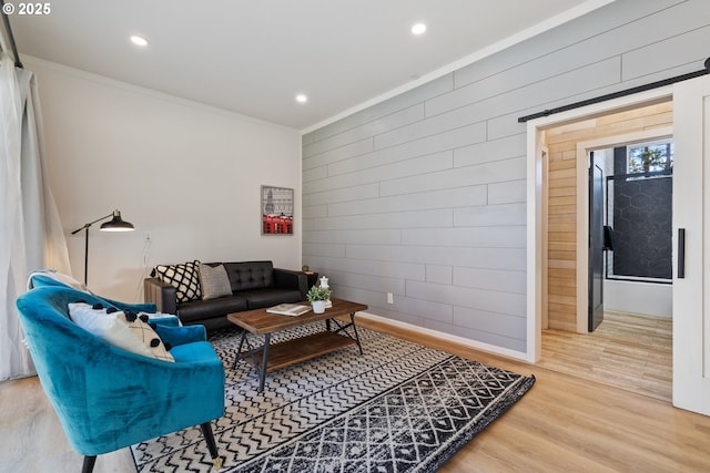 27650 SW Canyon Creek Rd, Wilsonville, OR 97070 - living room featuring crown molding, wood finished floors, wooden walls, and recessed lighting