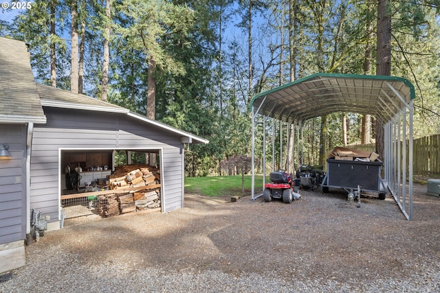 27650 SW Canyon Creek Rd, Wilsonville, OR 97070 - view of parking featuring a carport and a garage