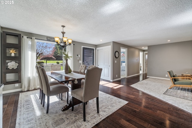 27650 SW Canyon Creek Rd, Wilsonville, OR 97070 - dining room with a chandelier, baseboards, hardwood / wood-style floors, a textured ceiling, and recessed lighting