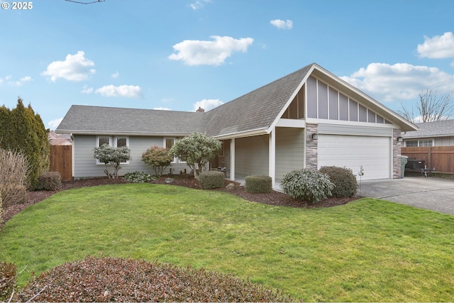 view of front of house featuring a garage and a front lawn