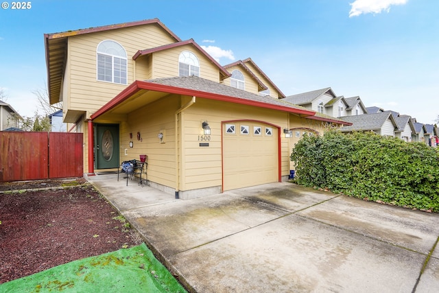 view of front of property featuring a garage