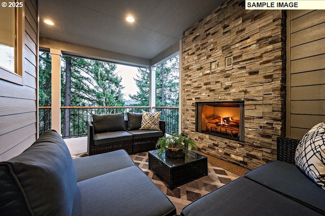 interior space featuring an outdoor stone fireplace