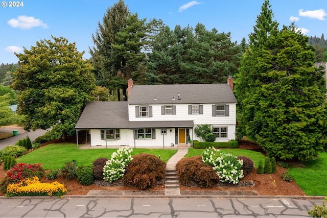 view of front of house with a front yard