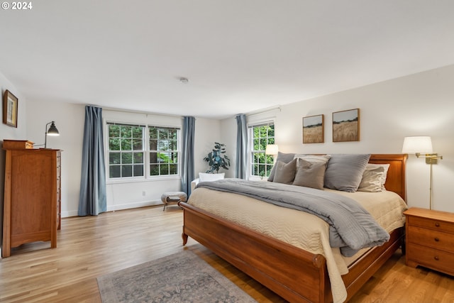 bedroom with light hardwood / wood-style floors