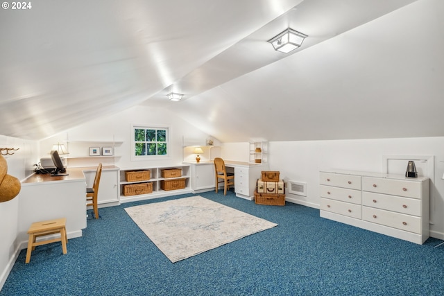 bonus room with vaulted ceiling and carpet floors