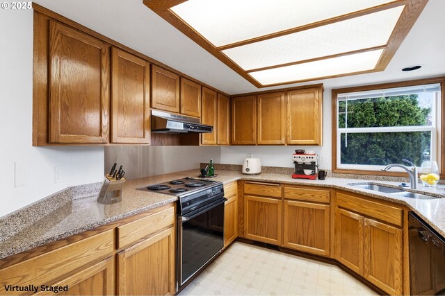 2744 Dayna Ln, Eugene, OR 97408 - kitchen featuring black appliances, under cabinet range hood, a sink, light flooring, and brown cabinetry