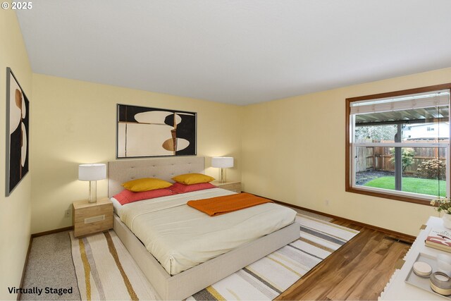 2744 Dayna Ln, Eugene, OR 97408 - bedroom with baseboards and wood finished floors