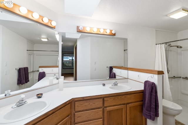 2744 Dayna Ln, Eugene, OR 97408 - bathroom featuring double vanity, a shower with shower curtain, and toilet