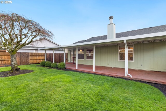 2744 Dayna Ln, Eugene, OR 97408 - rear view of house featuring a chimney and a wooden deck