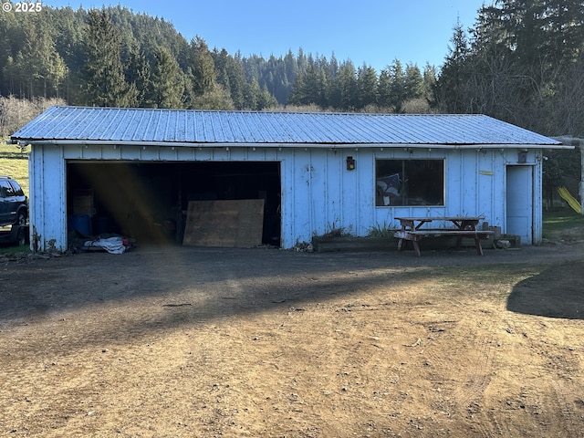 view of outbuilding with a garage