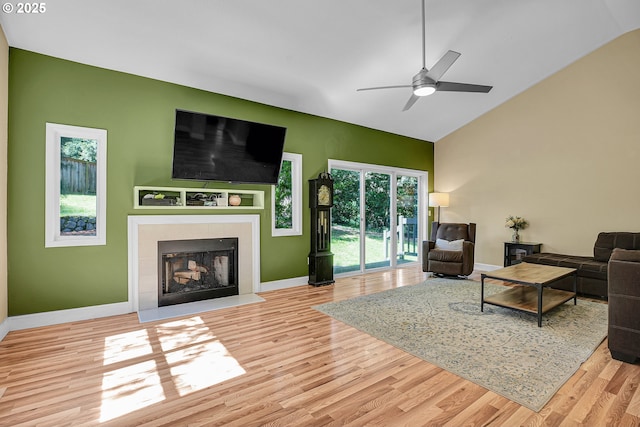 1223 NE 160th Ave, Portland, OR 97230 - living room featuring baseboards, ceiling fan, wood finished floors, and high vaulted ceiling
