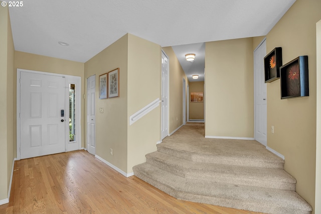 1223 NE 160th Ave, Portland, OR 97230 - entrance foyer with baseboards, stairs, and light wood finished floors