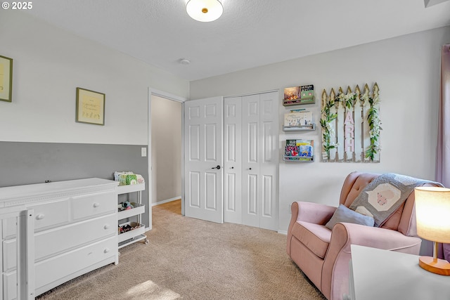 1223 NE 160th Ave, Portland, OR 97230 - living area featuring baseboards, carpet flooring, and a textured ceiling