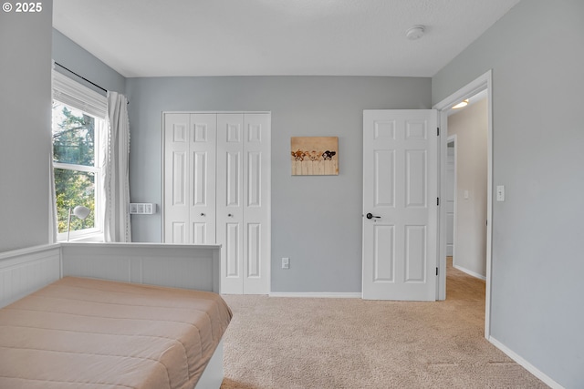 1223 NE 160th Ave, Portland, OR 97230 - carpeted bedroom featuring baseboards and a closet