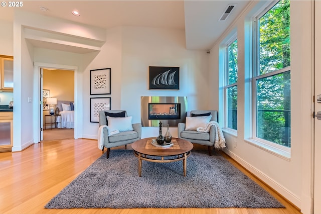 4300 SW Hewett Blvd, Portland, OR 97221 - sitting room featuring light wood-type flooring and plenty of natural light