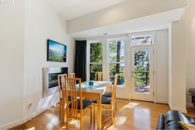 dining room featuring light hardwood / wood-style flooring