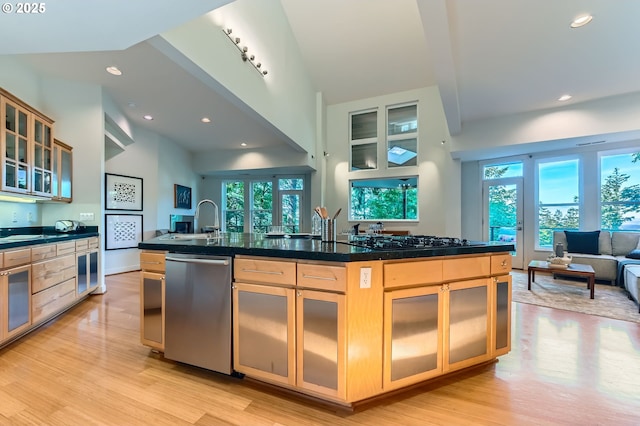 4300 SW Hewett Blvd, Portland, OR 97221 - kitchen featuring dishwasher, gas stovetop, open floor plan, light wood-type flooring, and plenty of natural light